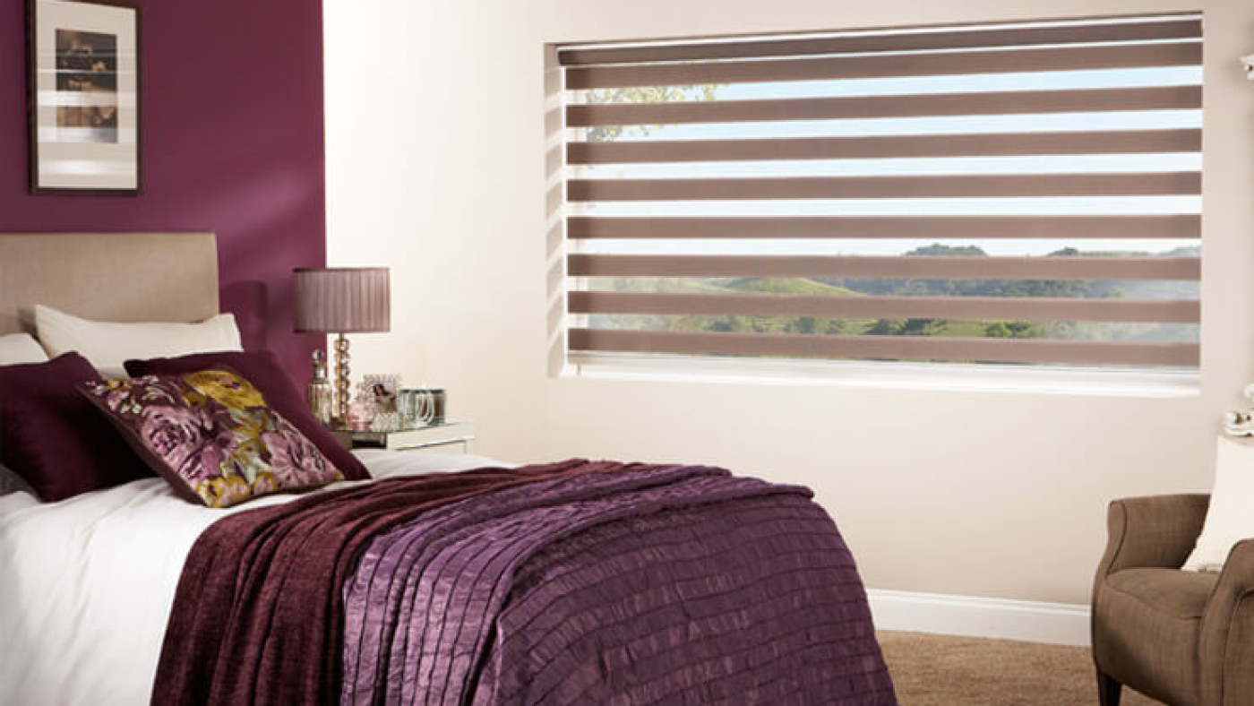 Mouve Blinds Behind Wjhite and Purple Room