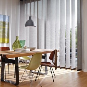 Large silver blinds in large room with laminated flooring