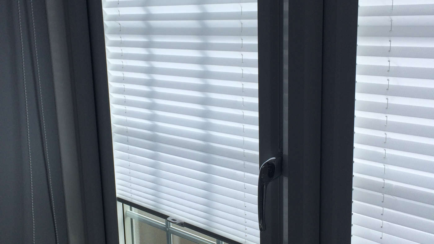 Silver Blinds in Doorway