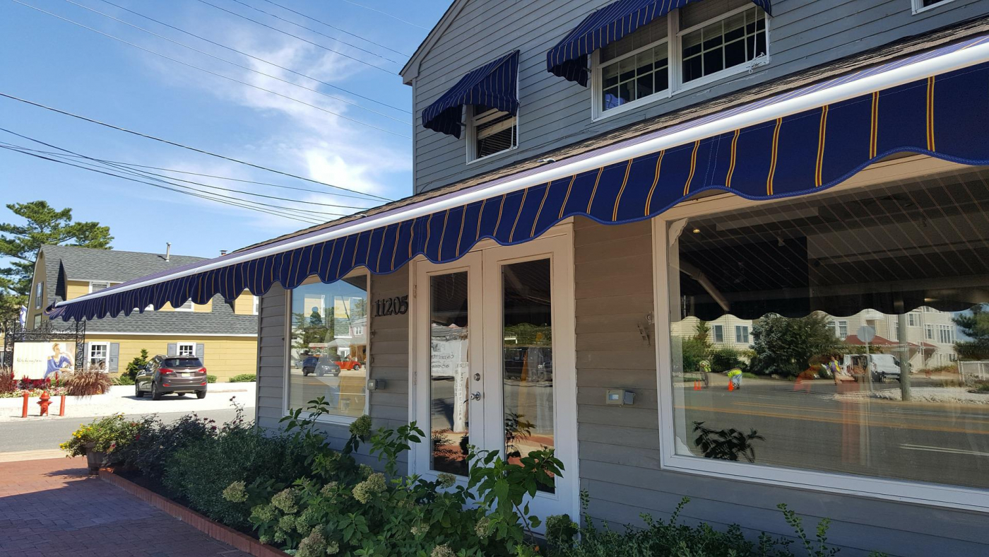 Blue tressel hanging from building